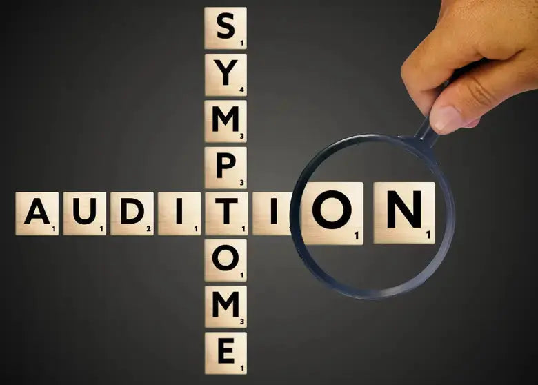 Les mots "symptôme" et "audition" se croisent à la manière de lettres de Scrabble 